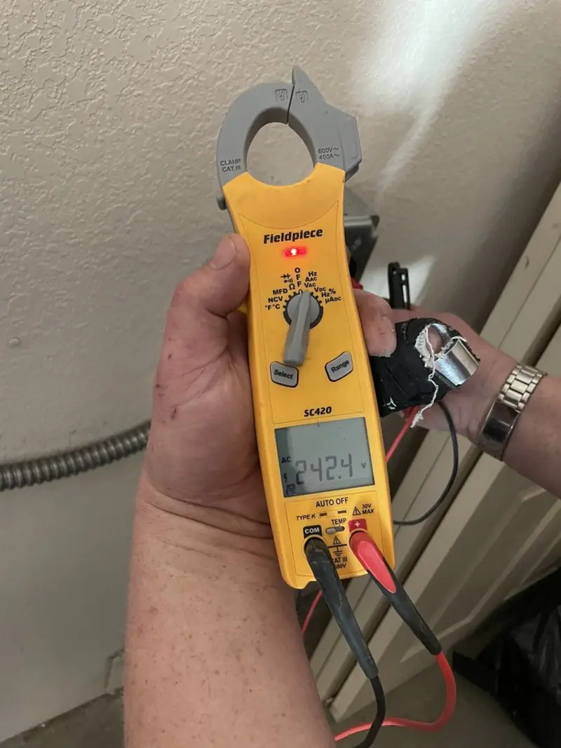 Voltage testing with clamp meter during Generator Installation in Saratoga